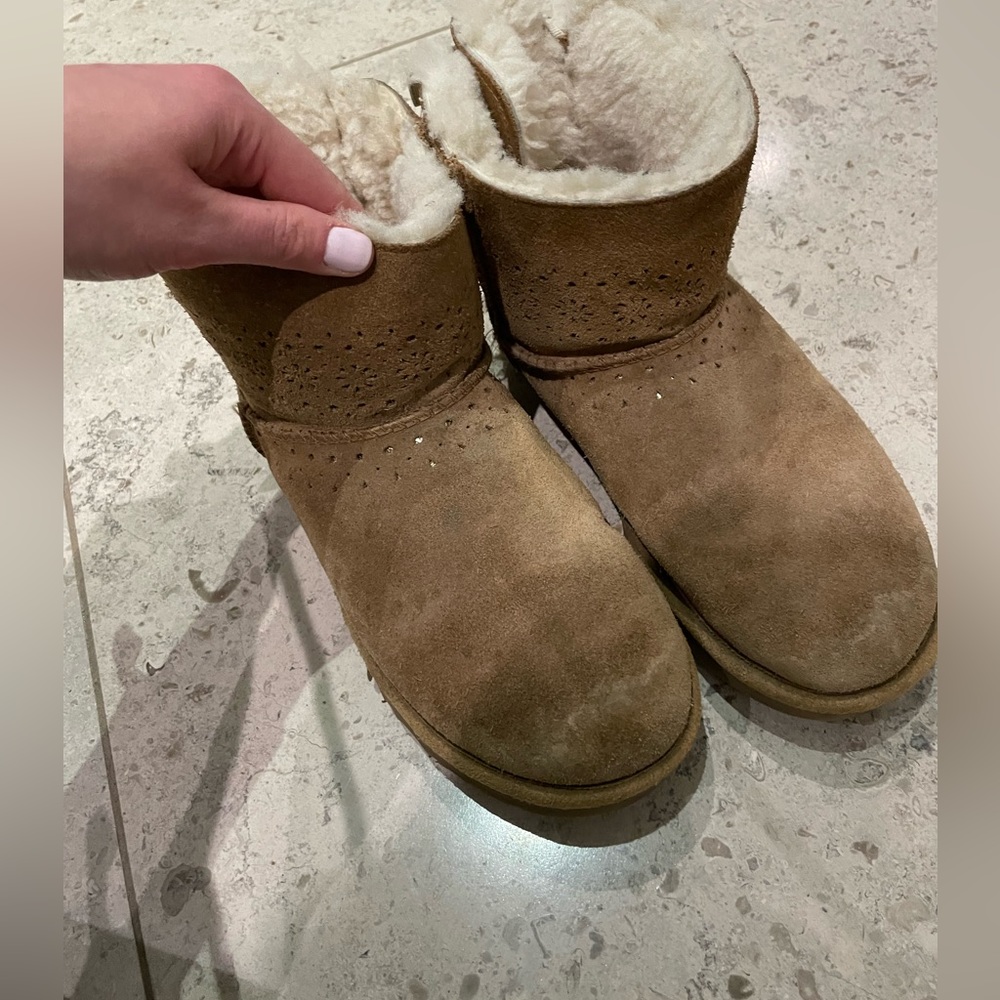 Above ankle UGG boots, bows on the back and sparkles on top, size US 6